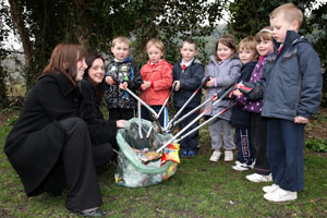 Children from Waunfawr Primary School with some of the litter they collected in Waunfawr Park