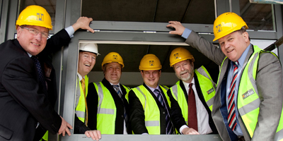 L-R Cllr Ron Davies; Bryn Davies, Principal; Malcolm Sainsbury, Senior Project Manager; Dave Haskell, Divisional Director, Jeff Cuthbert AM and Lindsay Whittle, leader of Caerphilly County Borough Council.