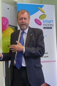 Caerphilly AM Jeff Cuthbert at the opening of Smart Money in Caerphilly