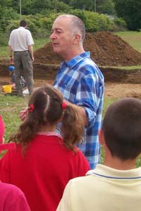 Time Team presenter Tony Robinson speaking to school children at the recent dig at Llancaiach Fawr