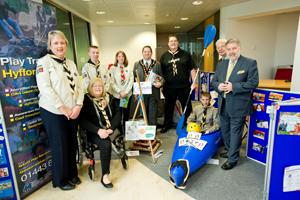 Mayor of CCBC, Cllr James Fussell, together with Bob Cooke of GAVO, special guest Roy Noble and the 1st Ystrad Mynach Scout Group
