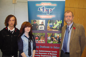 Lewis Hall, of Bedwas High School, and Harriet Risby, of Lewis Girls’ School, with Caerphilly AM Jeff Cuthbert