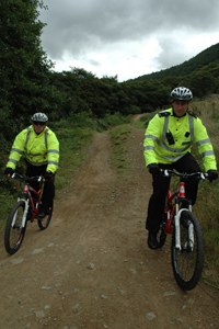 PC Leighton Webb and PCSO Allan Mills patrolling Cwmcarn Forest