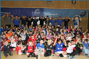 Cardiff City stars Aaron Ramsey and Darcy Blake together with more than 100 youngsters at the Football for All launch