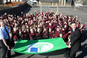 Maesycwmmer Primary School celebrating their Green Flag award