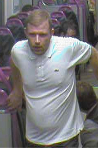 CCTV image of a man BTP would like to speak to in connection with an alleged sexual offence at Caerphilly railway station