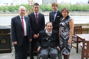 Caerphilly MP Wayne David (left) with Paul Davies MBE and family