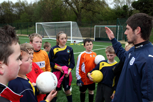 Cardiff City FC Community Coaches put school children through their paces with a series of skills workshops