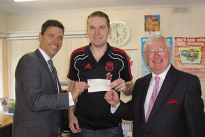 Islwyn MP Chris Evans with Gareth Chiplin, of Islwyn Community Credit Union and Lord Don Touhig