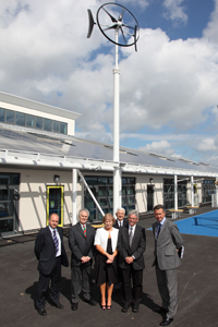 Peter Davies joins representatives from CCBC at the new Greenhill Primary School in Gelligaer