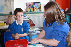 Pupils from Markham Primary School learning the correct hand washing technique