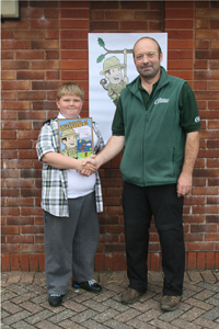 Joshua Jones with his winning design, and Aberbargoed Ranger Mark Allen