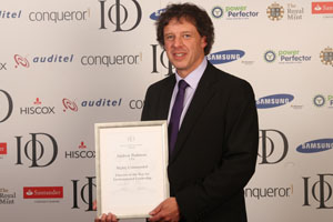 Andrew Padmore, non-executive director at UES with his IoD award