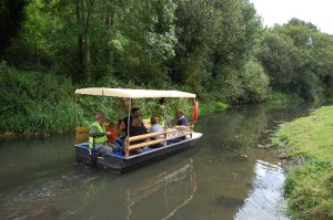 Chris Evans MP enjoys a boat ride during the Community Waterways Festival in Risca