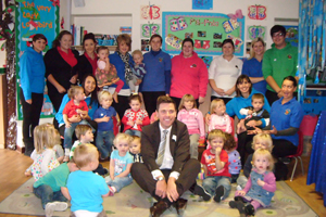 Chris Evans MP with staff and children from Penrhiw Nursery