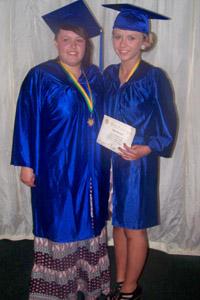 Two Caerphilly youngsters taking part in their graduation from the Children's University