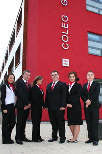 Coleg Gwent travel and tourism students show off their new uniforms