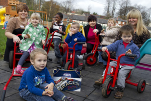 From left Ceri Jenkins, owner of Tiptoes, children at the nursery and Lydia Whitfield, Head of Communications at Brace’s (right)