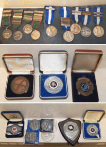 The medals were found at a property in Gelligaer and are believed to have been stolen