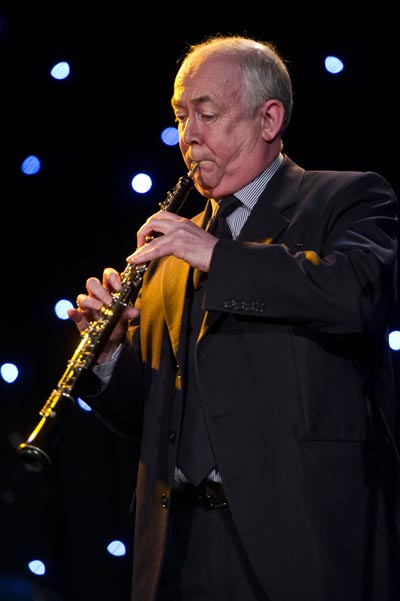 Wayne David plays his oboe at a recent charity concert