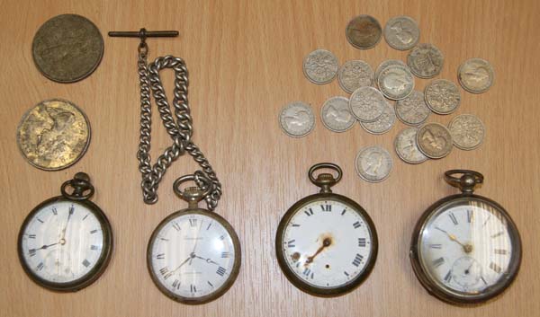 Watches and coins found in a field in Blackwood