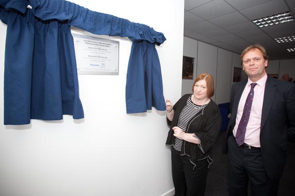 Welsh Business Minister Edwina Hart and Simon Downing unveil the plaque
