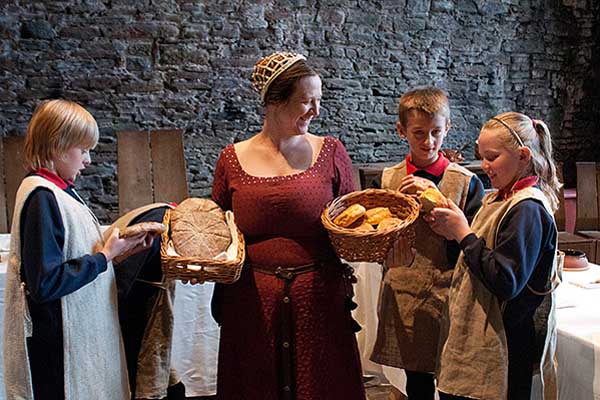 Young people taking part in a discovery visit to the Castle. Caerphilly Castle 