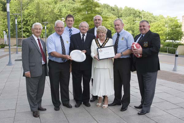Caerphilly County Borough's Mayor Gaynor Oliver and council leader Harry Andrews congratulate the rugby teams