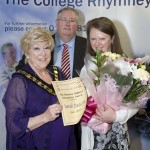Sarah Deacon receives her award from Mayor Gaynor Oliver. Also pictured is Deputy Principal Paul Martin