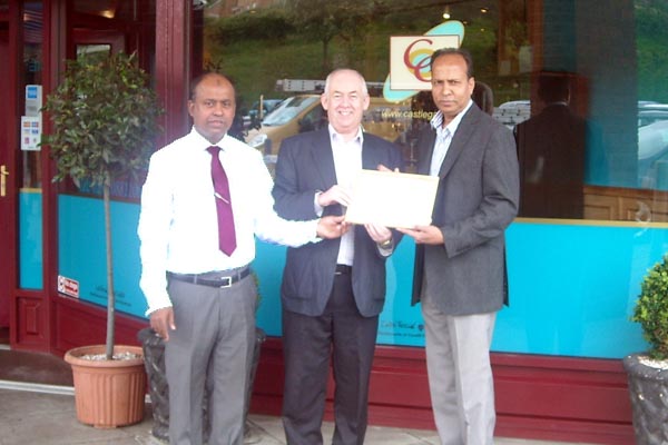 Wayne David with Ashraful Haquq and Kamran Rajen Hussin from the Castle Gate Indian Restaurant