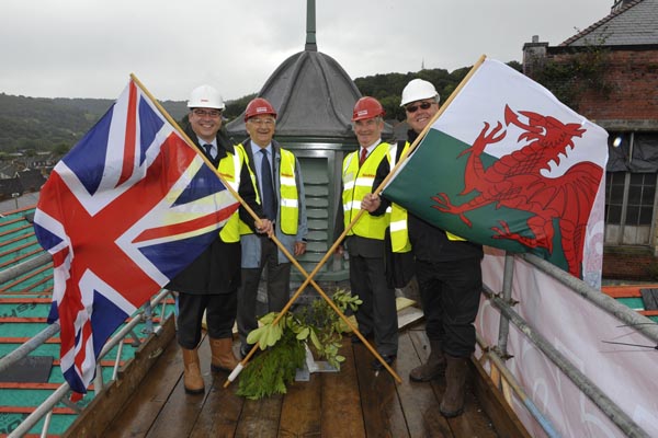 Pictured at the topping out event are, left to right, Neil Turley, business development manager, Seddon Construction; Cllr Harry Andrews, Leader of Caerphilly County Borough Council leader; Howard Stone, chair of the Newbridge ‘Memo’ Trustees and Alwyn Jones, architect.