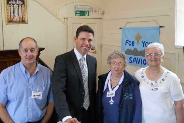 Chris Evans MP alongside Fleur-de-Lys history society chairperson Ros Parker and society members Allan Parker and Marlene Hathaway.