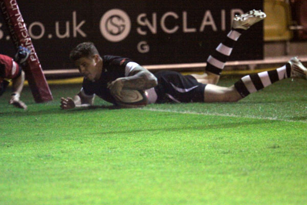Ross Wardle crosses for a try versus Newport