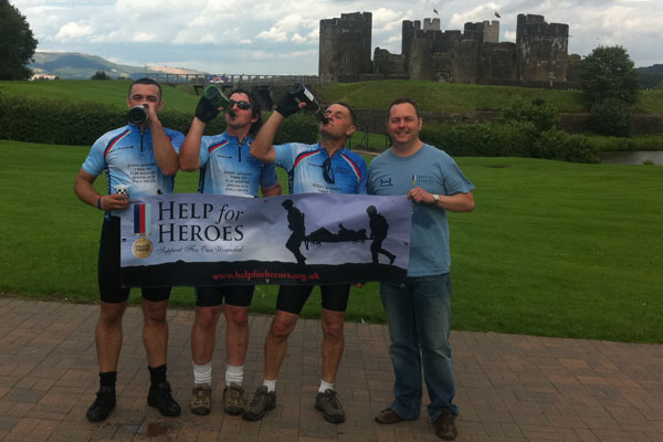 The Castle Kings enjoy a well-deserved drink after their 190 mile cycle ride in aid of Help for Heroes
