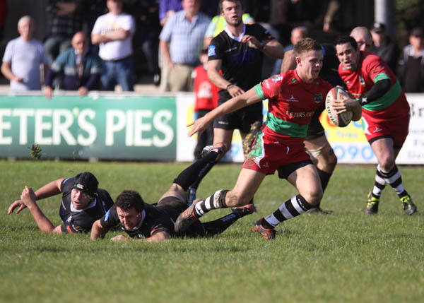 Ethan leaves the Neath defence grasping at air as he crosses for a try