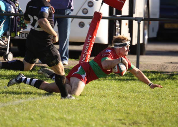 Matthew John dives in for a try versus Neath