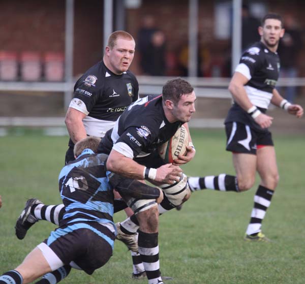 James Thomas takes on Cardiff's Will Thomas
