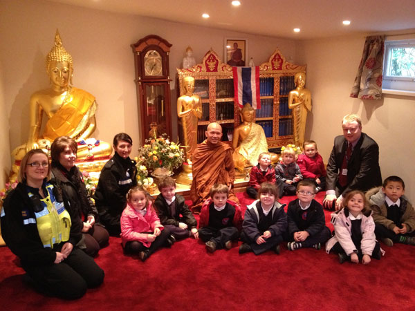 Pupils and visitors at Rhymney's Thai Buddhist Temple