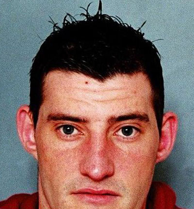 Stephen Thomas, 25, is wanted by police after breaching the conditions of his release licence