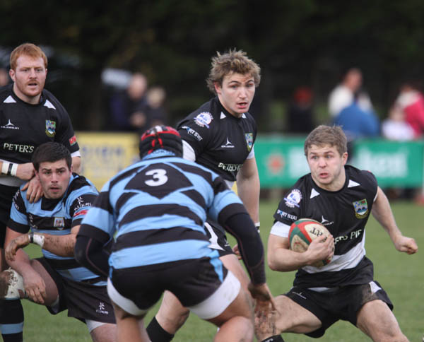 Tom Rowlands looks for a way through the Cardiff defence