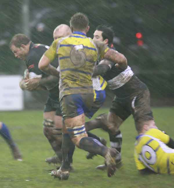 Man of the Match Deri Mattravers carries the ball