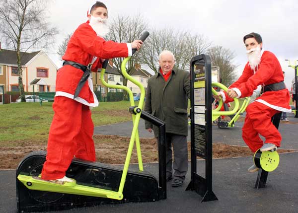  Cllr Dave Poole with pupils from Blackwood Comprehensive try out the new outdoor gym in Blackwood