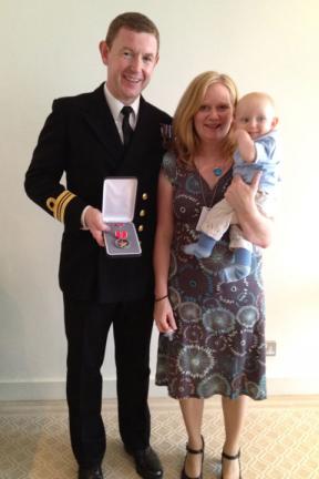 Gareth Morgan with wife Nikki and son Henry with his Bronze Star Medal