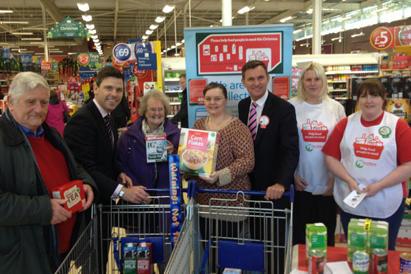 Chris Evans MP with staff at Tesco Risca Extra in Risca and Crosskeys Councillor Michael Gray 