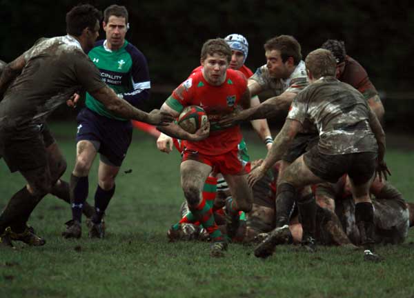 Bedwas scrum half Tom Rowlands looks for a gap in the Neath defence