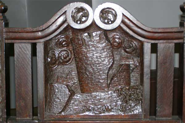 One of the historic chairs depict Caerphilly Castle's famous leaning tower - Picture by Caerphilly Local History Society