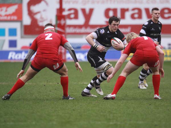 James Benjamin takes on Dan Thomas his Llanelli counterpart