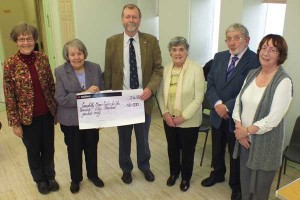 Jeff Cuthbert AM receives the £50,000 donation from the League of Friends - Photo by Dean Williams