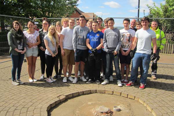 Friends have helped dig out the space where the memorial to Jack Thomas will be placed