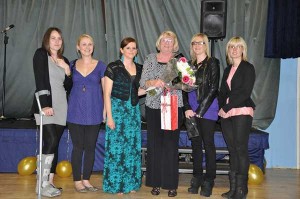 Pat Evans (centre right) is retiring after 50 years